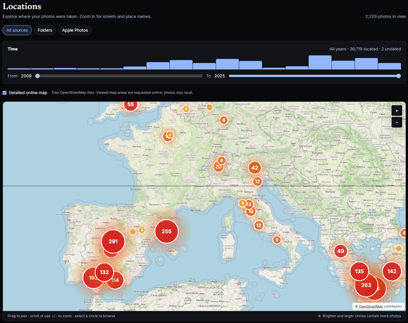 MemoryLane Locations view showing geotagged photographs clustered across an offline world map with a year filter